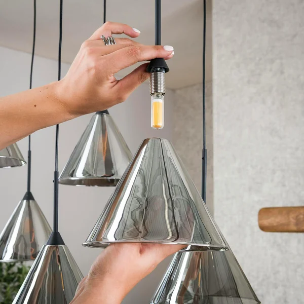 Suspension design en verre fumé 9 abat-jour coniques RALF