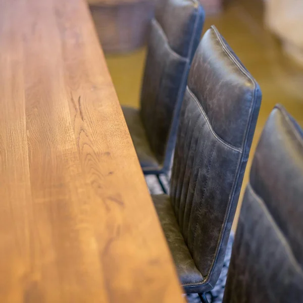 Table salle à manger bois métal pied croisé 240 cm OKA